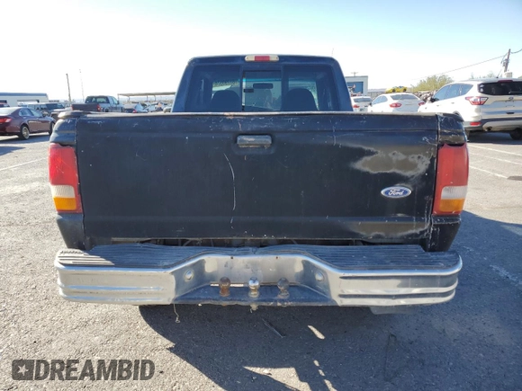 1997 Ford Ranger XLT with VIN 1FTCR15X2VPA50685, listed as a Copart auction lot 81790574 with 128,458 mi miles and Salvage Title. Bid and sale history available at DreamBid. Image 6.