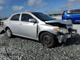 2009 Toyota Corolla with VIN 1NXBU40E59Z072524, listed as a Copart auction lot 51130605 with 218,385 mi miles and Salvage Title. Bid and sale history available at carsss.com. Image 4.