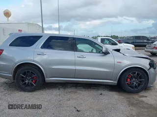 2018 Dodge Durango SRT with VIN 1C4SDJGJ5JC256006, listed as a IAAI auction lot 41038356 with 71,385 mi miles and . Bid and sale history available at DreamBid. Image 13.