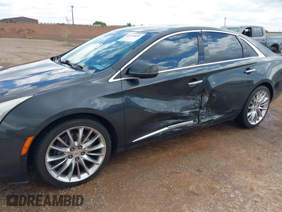 2013 Cadillac XTS Platinum z VIN 2G61V5S32D9102537, wystawiony jako IAAI lot #42230895 z przebiegiem 120 810 mil mil oraz . Historia ofert i sprzedaży dostępna na DreamBid. Obrazek 6.