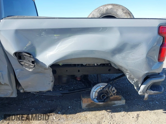 2024 Chevrolet Silverado 1500 Custom with VIN 1GCPABEK9RZ232509, listed as a IAAI auction lot 40923116 with 12,719 mi miles and . Bid and sale history available at DreamBid. Image 6.