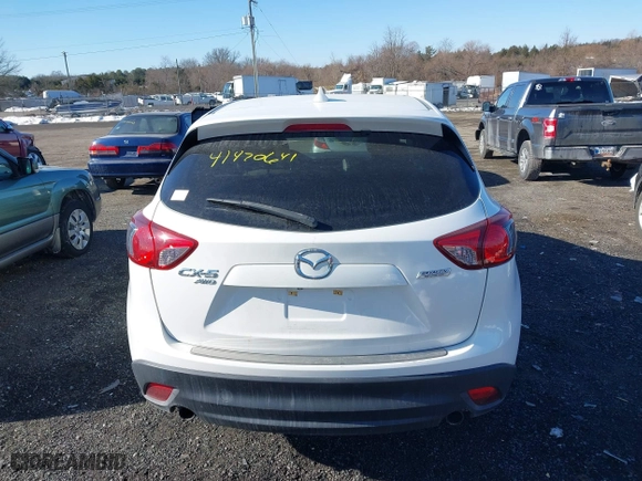 2016 Mazda CX-5 Touring with VIN JM3KE4CYXG0917841, listed as a IAAI auction lot 41420641 with 75,710 mi miles. Bid and sale history available at carsss.com. Image 16.