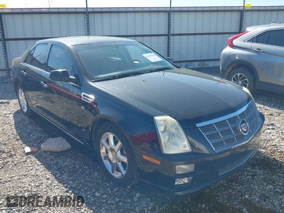 2008 Cadillac STS RWD z VIN 1G6DW67V780113057, wystawiony jako IAAI lot #41997608 z przebiegiem 159 968 mil mil oraz . Historia ofert i sprzedaży dostępna na DreamBid. Obrazek 1.
