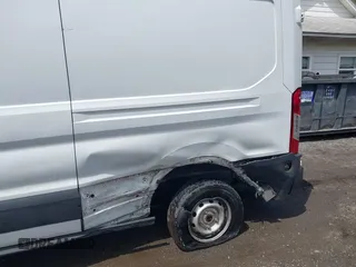 2019 Ford Transit with VIN 1FTYR2CM7KKA20062, listed as a IAAI auction lot 42028348 with 177,377 mi miles and . Bid and sale history available at DreamBid. Image 6.
