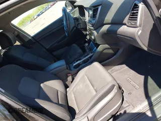 2016 Hyundai Tucson SE z VIN KM8J3CA47GU075162, wystawiony jako IAAI lot #42231685 z przebiegiem 177 038 mil mil oraz . Historia ofert i sprzedaży dostępna na DreamBid. Obrazek 5.