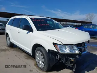 2019 Dodge Journey SE Value with VIN 3C4PDCAB1KT868065, listed as a IAAI auction lot 41642318 with 97,735 mi miles and . Bid and sale history available at DreamBid. Image 1.