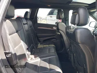 2014 Jeep Grand Cherokee Overland with VIN 1C4RJFCT8EC106005, listed as a IAAI auction lot 41989721 with 148,469 mi miles and . Bid and sale history available at DreamBid. Image 8.