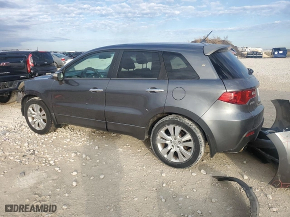 2010 Acura RDX Tech Pkg with VIN 5J8TB2H56AA004358, listed as a Copart auction lot 83013664 with 124,224 mi miles and Salvage Title. Bid and sale history available at carsss.com. Image 2.
