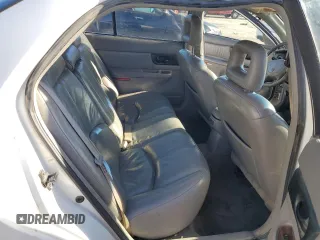 1999 Buick Regal GS with VIN 2G4WF521XX1419026, listed as a Copart auction lot 82878144 with 0 mi miles and Salvage Title. Bid and sale history available at carsss.com. Image 10.