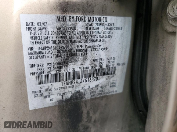 2007 Ford Five Hundred SEL with VIN 1FAHP24137G163701, listed as a Copart auction lot 60826555 with 169,948 mi miles and Salvage title. Bid and sale history available at DreamBid. Image 12.