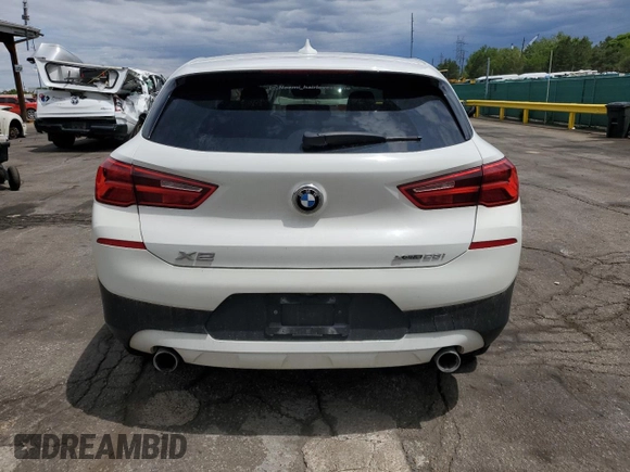 2018 BMW X2 xDrive28i z VIN WBXYJ5C38JEF79686, wystawiony jako Copart lot #56988735 z przebiegiem 103 799 mil mil oraz Szkoda całkowita • Salvage title. Historia ofert i sprzedaży dostępna na DreamBid. Obrazek 6.