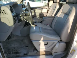 2007 GMC Envoy SLE with VIN 1GKDS13S172290928, listed as a Copart auction lot 74128924 with 119,282 mi miles and Salvage Title. Bid and sale history available at carsss.com. Image 7.