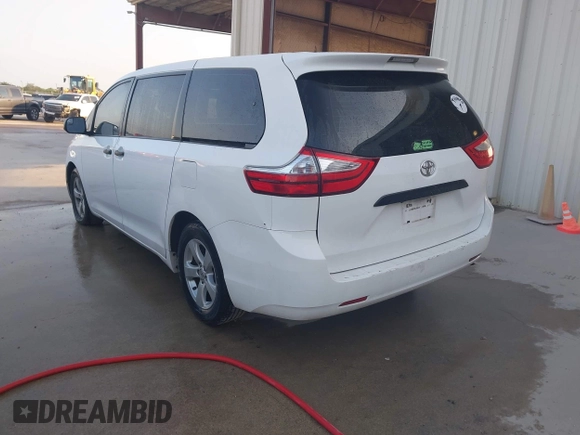 2015 Toyota Sienna L with VIN 5TDZK3DC5FS657115, listed as a IAAI auction lot 42109678 with 176,995 mi miles. Bid and sale history available at carsss.com. Image 3.