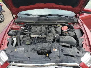 2015 Ford Taurus SEL with VIN 1FAHP2E88FG166961, listed as a Copart auction lot 61429255 with 124,780 mi miles and Salvage title. Bid and sale history available at DreamBid. Image 11.