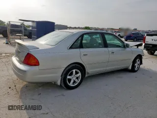 2002 Toyota Avalon XL z VIN 4T1BF28B22U200555, wystawiony jako Copart lot #54544265 z przebiegiem 146 031 mil mil oraz Tytuł czysty. Historia ofert i sprzedaży dostępna na DreamBid. Obrazek 3.