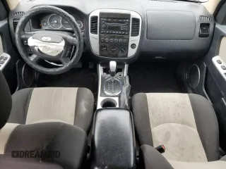 2007 Mercury Mariner Luxury with VIN 4M2YU91107KJ07772, listed as a Copart auction lot 42867545 with 128,235 mi miles and Salvage title. Bid and sale history available at DreamBid. Image 8.