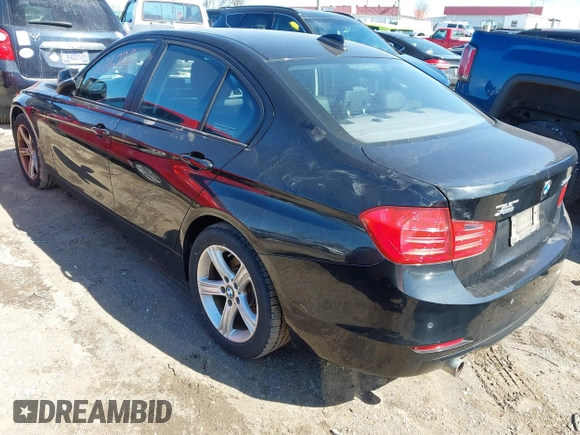 2014 BMW 3 Series 328d xDrive with VIN WBA3D5C54EF147199, listed as a IAAI auction lot 41626737 with 98,281 mi miles. Bid and sale history available at carsss.com. Image 3.