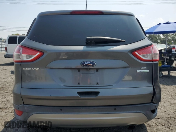 2014 Ford Escape SE z VIN 1FMCU0GX0EUE27453, wystawiony jako Copart lot #59437875 z przebiegiem 154 177 mil mil oraz Czysty tytuł • Clean title. Historia ofert i sprzedaży dostępna na DreamBid. Obrazek 6.
