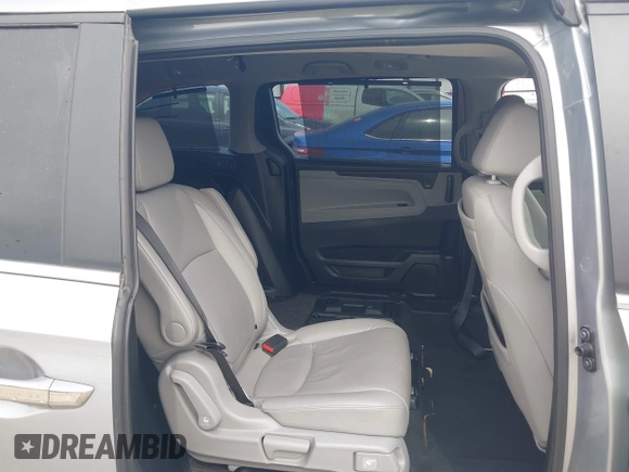 2021 Honda Odyssey Touring with VIN 5FNRL6H8XMB034837, listed as a IAAI auction lot 41856444 with 84,950 mi miles. Bid and sale history available at carsss.com. Image 8.