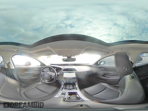 2019 Jaguar XE 25t z VIN SAJAR4FX6KCP52410, wystawiony jako Copart lot #82199484 z przebiegiem 89 027 mil mil oraz Szkoda całkowita • Salvage title. Historia ofert i sprzedaży dostępna na DreamBid. Obrazek 14.