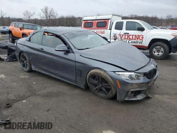 2015 BMW 4 Series 435i xDrive with VIN WBA3T7C56FP942328, listed as a Copart auction lot 52410695 with Not provided miles and Salvage title. Bid and sale history available at DreamBid. Image 4.