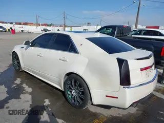 2010 Cadillac CTS with VIN 1G6DK5EVXA0102844, listed as a IAAI auction lot 41818267 with 127,517 mi miles and . Bid and sale history available at DreamBid. Image 3.