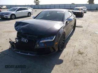 2015 Audi RS 7 Prestige z VIN WUAW2AFC6FN900136, wystawiony jako Copart lot #54558253 z przebiegiem 69 045 mil mil oraz . Historia ofert i sprzedaży dostępna na DreamBid. Obrazek 1.