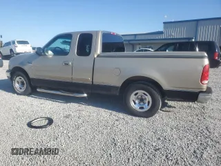 1999 Ford F-150 with VIN 1FTRX17W9XNB77873, listed as a Copart auction lot 52851065 with Not provided miles and Salvage title. Bid and sale history available at DreamBid. Image 2.