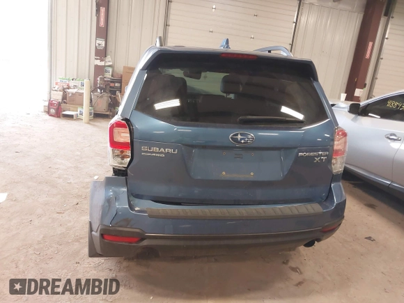 2018 Subaru Forester Premium with VIN JF2SJGECXJH606668, listed as a IAAI auction lot 41879710 with 64,910 mi miles. Bid and sale history available at carsss.com. Image 16.