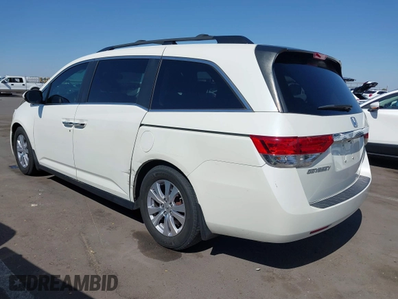 2016 Honda Odyssey EX-L with VIN 5FNRL5H67GB128929, listed as a IAAI auction lot 42126878 with 157,836 mi miles. Bid and sale history available at carsss.com. Image 3.