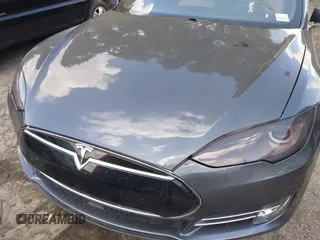 2014 Tesla Model S P85D with VIN 5YJSA1H29EFP63032, listed as a IAAI auction lot 42132145 with Not Provided miles and . Bid and sale history available at DreamBid. Image 6.