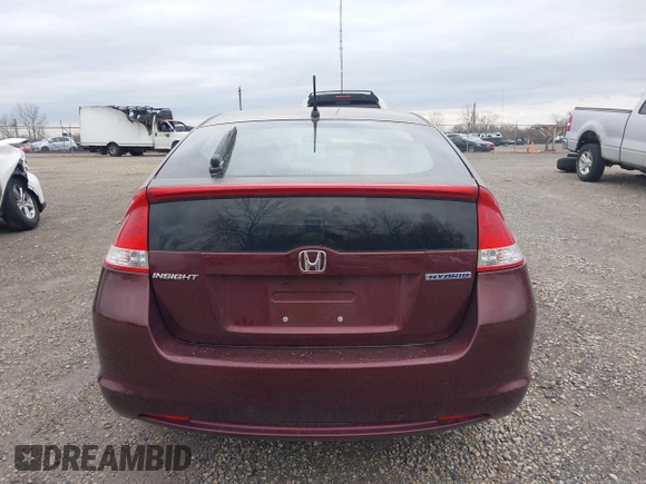 2011 Honda Insight LX z VIN JHMZE2H52BS004304, wystawiony jako IAAI lot #41827541 z przebiegiem 141 072 mil mil oraz . Historia ofert i sprzedaży dostępna na DreamBid. Obrazek 16.
