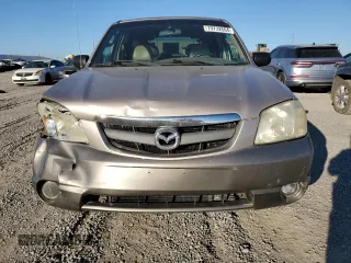 2002 Mazda Tribute LX with VIN 4F2YU09182KM36685, listed as a Copart auction lot 79732664 with 204,262 mi miles and Salvage Title. Bid and sale history available at carsss.com. Image 5.