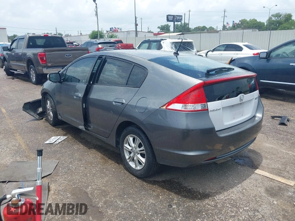 2010 Honda Insight EX z VIN JHMZE2H72AS023404, wystawiony jako IAAI lot #42505042 z przebiegiem Nie podano mil oraz . Historia ofert i sprzedaży dostępna na DreamBid. Obrazek 3.