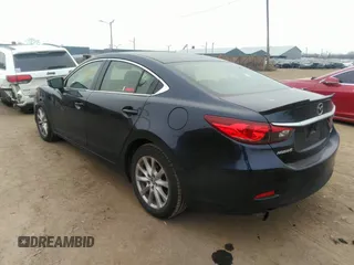 2015 Mazda 6 i Sport with VIN JM1GJ1U51F1185105, listed as a IAAI auction lot 41287570 with 133,016 mi miles and . Bid and sale history available at carsss.com. Image 3.