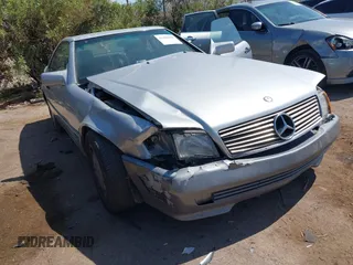 1994 Mercedes-Benz SL 5.0L with VIN WDBFA67E7RF099016, listed as a IAAI auction lot 42408198 with 174,574 mi miles and . Bid and sale history available at DreamBid. Image 6.