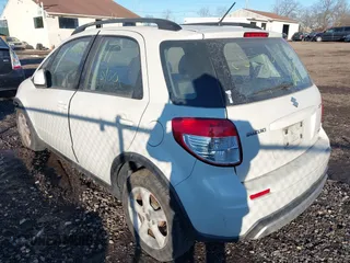 2009 Suzuki SX4 Man AWD with VIN JS2YB413196201614, listed as a IAAI auction lot 41437522 with Not Provided miles. Bid and sale history available at carsss.com. Image 3.