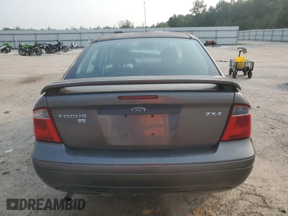 2006 Ford Focus S с VIN 1FAHP34N06W115926, выставлен на аукционе Copart как лот 59145555 с пробегом 263 717 миль миль и Списание • Salvage title. История ставок и продаж доступна на DreamBid. Изображение 6.
