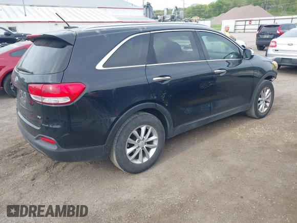 2018 Kia Sorento LX with VIN 5XYPG4A51JG352947, listed as a IAAI auction lot 42201063 with 111,431 mi miles and . Bid and sale history available at DreamBid. Image 4.
