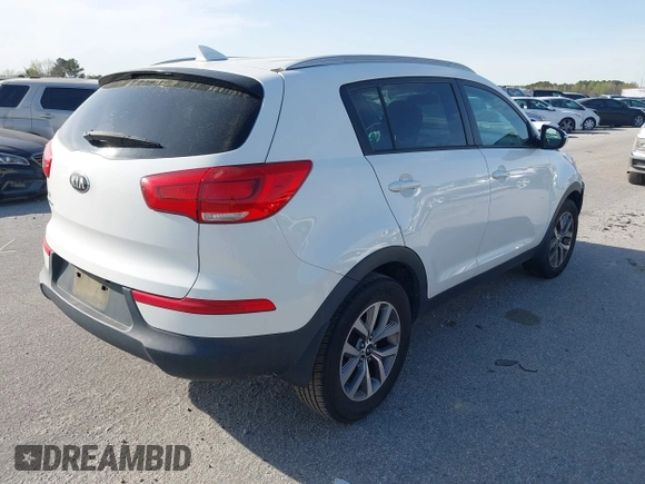 2015 Kia Sportage LX with VIN KNDPB3AC3F7742718, listed as a IAAI auction lot 41877257 with 215,101 mi miles and . Bid and sale history available at carsss.com. Image 4.