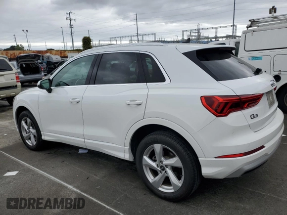 2021 Audi Q3 Premium with VIN WA1AUCF39M1061658, listed as a Copart auction lot 50717875 with 87,363 mi miles and Salvage title. Bid and sale history available at DreamBid. Image 2.