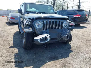 2022 Jeep Wrangler Unlimited Sahara with VIN 1C4HJXEM7NW206585, listed as a IAAI auction lot 42102516 with 10,769 mi miles and . Bid and sale history available at DreamBid. Image 6.