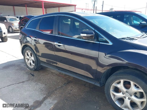 2010 Mazda CX-7 Touring with VIN JM3ER2W33A0344584, listed as a IAAI auction lot 41290665 with NaN miles. Bid and sale history available at carsss.com. Image 4.