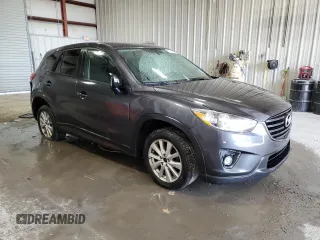 2016 Mazda CX-5 Touring with VIN JM3KE4CY3G0716346, listed as a Copart auction lot 51467895 with 133,218 mi miles and Salvage Title. Bid and sale history available at carsss.com. Image 4.