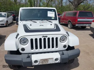 2012 Jeep Wrangler Unlimited Sahara with VIN 1C4HJWEG3CL254944, listed as a IAAI auction lot 42060981 with 172,358 mi miles. Bid and sale history available at carsss.com. Image 6.