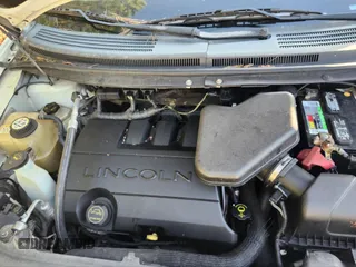 2007 Lincoln MKX with VIN 2LMDU88C77BJ25637, listed as a IAAI auction lot 41886392 with 164,976 mi miles. Bid and sale history available at carsss.com. Image 10.