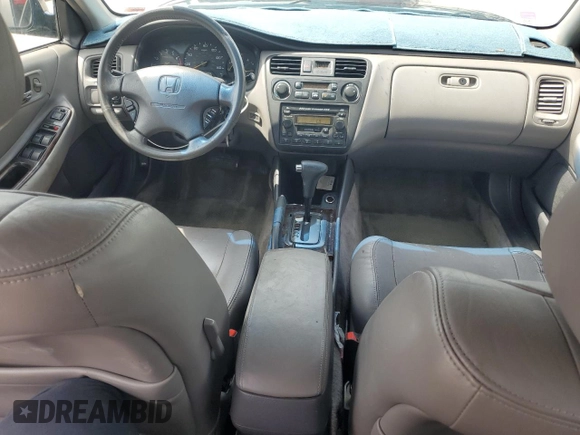 2002 Honda Accord EX z VIN 1HGCG16582A057594, wystawiony jako Copart lot #54874665 z przebiegiem 173 709 mil mil oraz Szkoda całkowita • Salvage title. Historia ofert i sprzedaży dostępna na DreamBid. Obrazek 8.