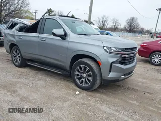 2023 Chevrolet Tahoe LT z VIN 1GNSKNKD9PR247594, wystawiony jako IAAI lot #41937963 z przebiegiem 40 408 mil mil oraz . Historia ofert i sprzedaży dostępna na DreamBid. Obrazek 1.