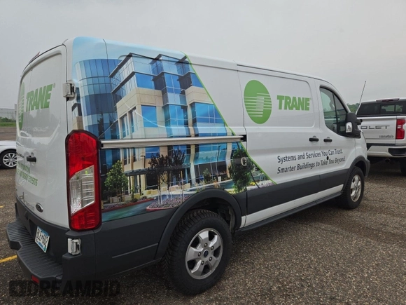 2018 Ford Transit with VIN 1FTYR1YG1JKB52228, listed as a IAAI auction lot 42832860 with 129,473 mi miles and . Bid and sale history available at DreamBid. Image 5.