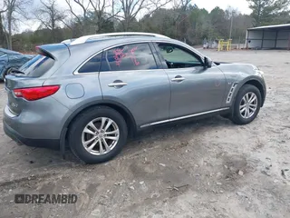 2015 Infiniti QX70 with VIN JN8CS1MWXFM480906, listed as a IAAI auction lot 41177811 with 176,527 mi miles and . Bid and sale history available at DreamBid. Image 5.